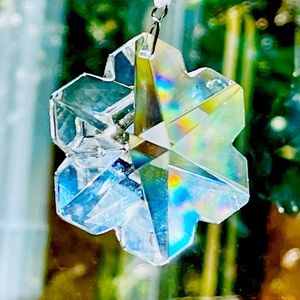 Etched Crystal snowflake 2” across hangs on 4” loop ribbon sunlight to rainbows